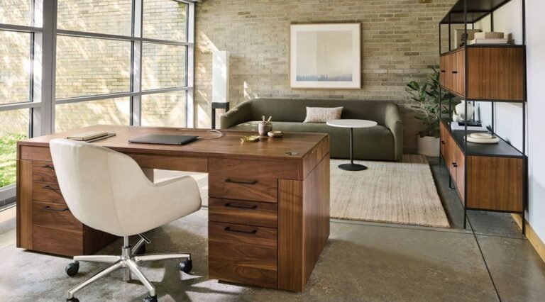 Room and board groups with structure dev Gensler at a particular hardwood desk.
